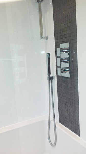 Tiled bathroom with walk-in shower